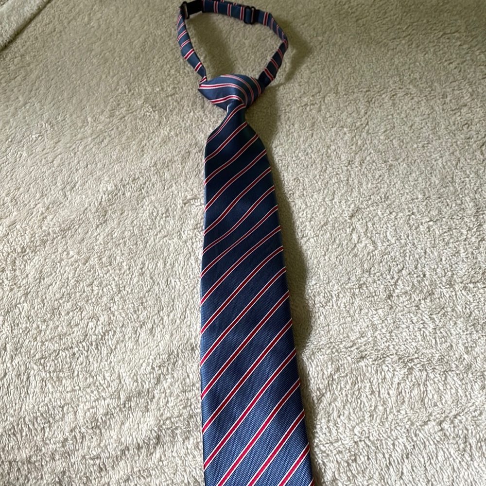 Kids adjustable neck tie. Blue and red striped.